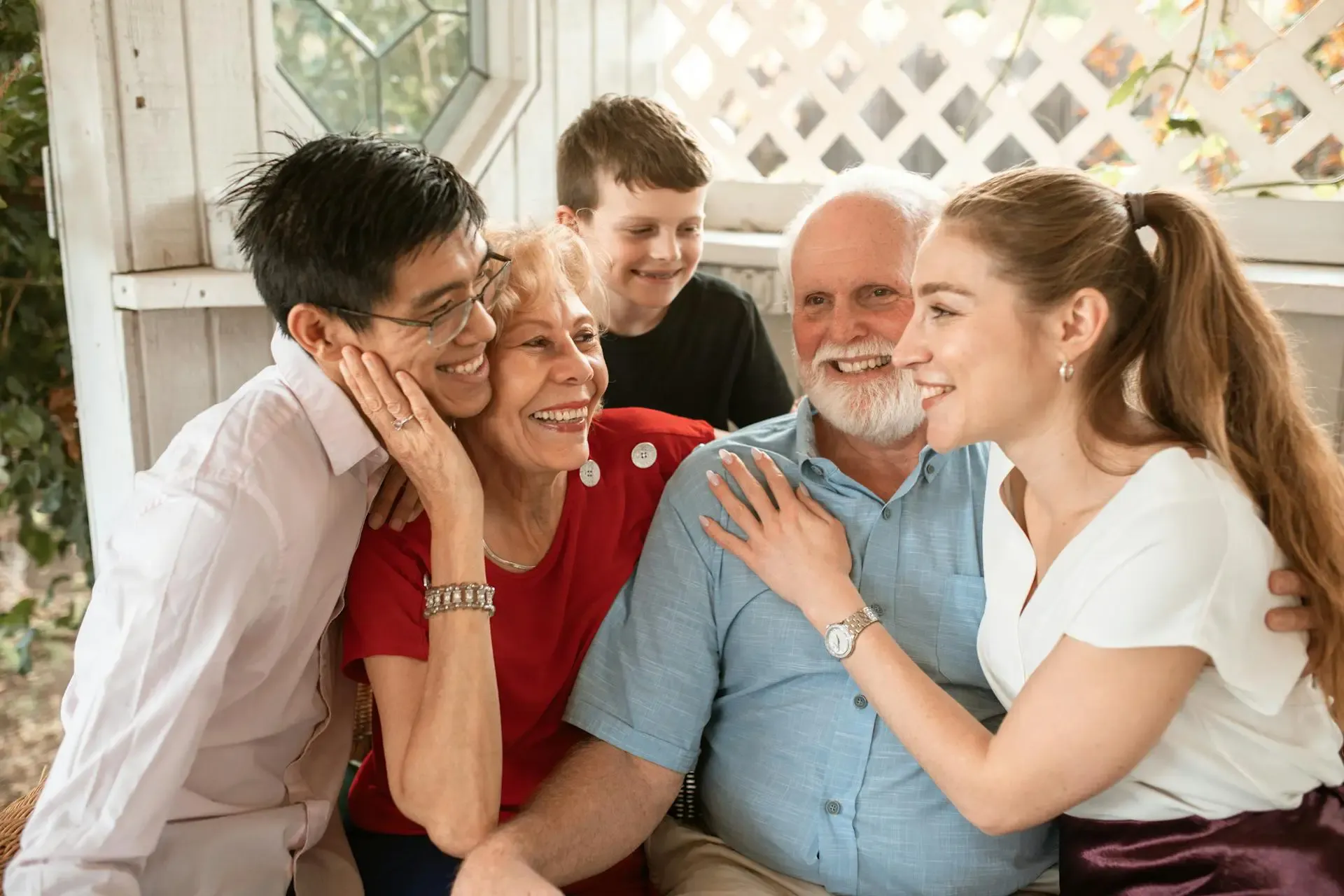 A family gathered on a porch